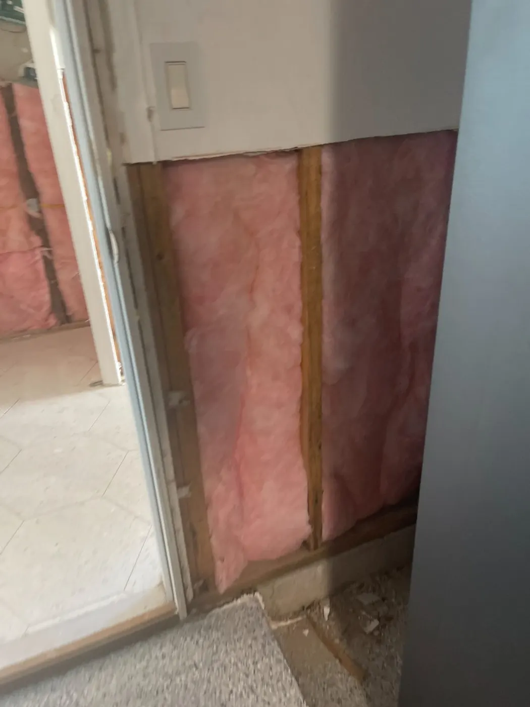 Flood-cut wall cavity opened for drying